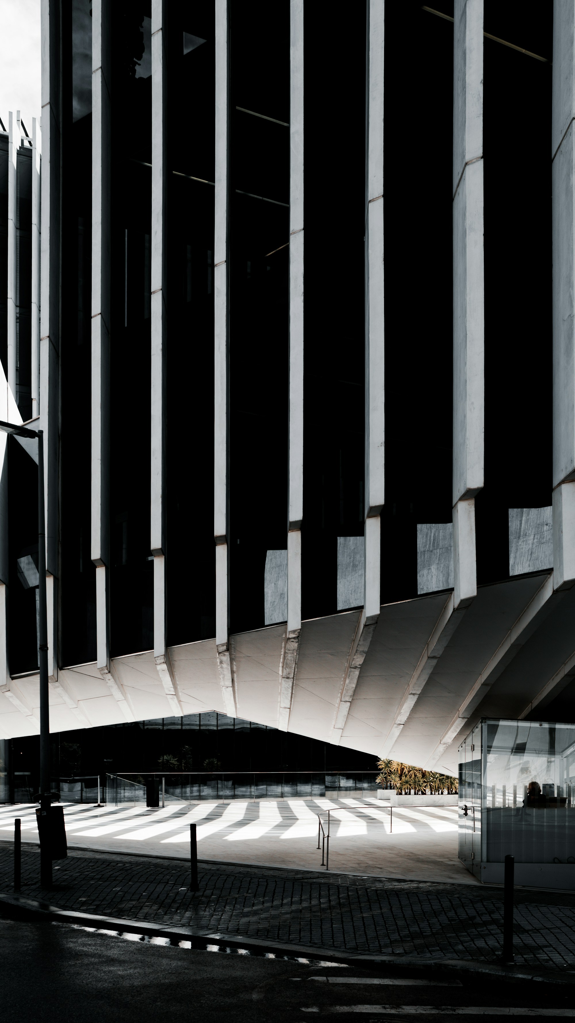 Modern architectural structure with dramatic light and shadow